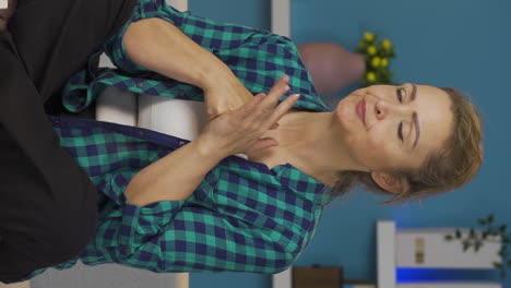 Vertical-video-of-Home-office-worker-woman-getting-angry.